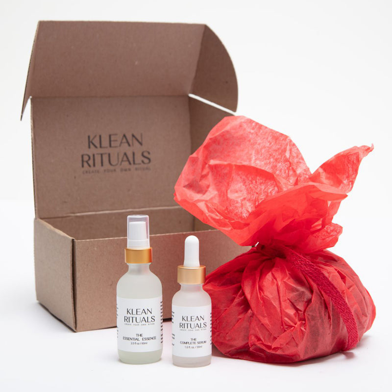 Klean Rituals Essential Essence Bottle and Complete Serum Bottle and box with red paper